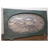 Amazing bowed beveled stained leaded glass window