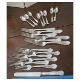 Ornate forks and spoons - many monogrammed
