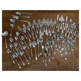 Large lot of flatware w/some odd serving pieces