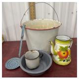 Enamel bucket, ladle, tea pot, cup and bowl
