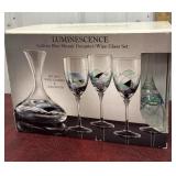 Luminescent galleria mosaic, decanter, and wine