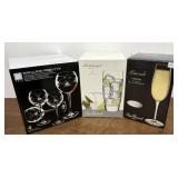 NIB wine glasses (4), champagne glasses (4), and