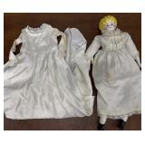 Doll with china head, arms and legs with extra