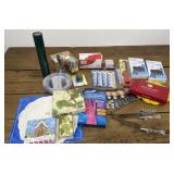 Batteries, plastic silverware, wine charms,
