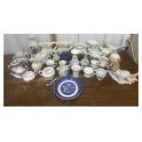 Vases, creamers, sugar bowls, tea cups etc *1