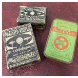 Grinding bits and Boy Scouts first aid tin