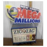 New York Lottery sign, & Zig Zag paper display