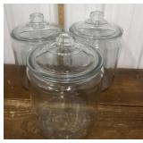 Large glass jars w/ lids *chip on 1 lid