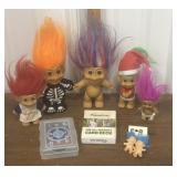 Troll dolls, earrings, playing cards