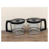 Two 14 cup, glass coffee carafes.