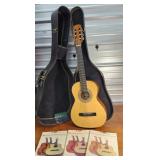 Hondo guitar with case and training books