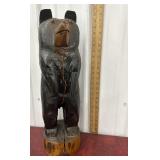 Log carved bear *has split