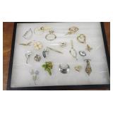 Showcase of brooches etc.. case included