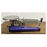 Triple balance scale. Purple.