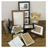 Assortment of albums and picture frames with