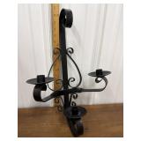 Heavy black metal candle holder