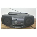 Sony cassette / CD / radio - turns on