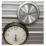 Clocks (2). One looks like an outdoor clock with