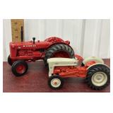McCormick and Ford toy tractors