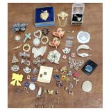 Costume jewelry brooches pins etc