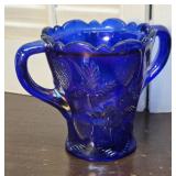Cobalt blue iridescent glass spooner