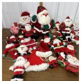 Plush Santas, Santa hats etc in a tote