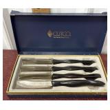4 Cutco serrated steak knives