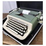 Royal Sabre green typewriter w/ case
