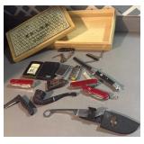 Wooden box full of goodies, zippo, camel, knifes,