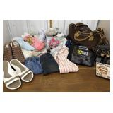 Pile of thick socks, shoes, binoculars, DVD,