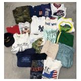 Assorted size shirts, pants, hat