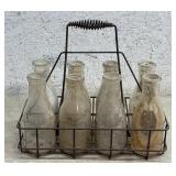 Milk Bottles in Iron Milk Rack