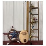 Wooden star, door knob wall art and ladder decor.