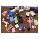 Doll house furniture and small doll figures