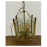 Vintage brass and glass dual-light hanging light.