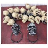 Halloween String of plastic skulls and door