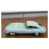 1960ï¿½s Jaguar model sports car radio, takes 9V -