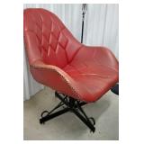 Mid-century bucket type swivel chair with ornate