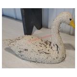 Ceramic swan with peeling paint