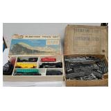 Electric Lionel train set & box of track
