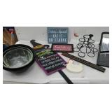 Box of signs, kitchen slicer, cupcake holder?,