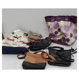 Group of purses and reusable bags including