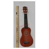 Small ukulele or guitar