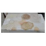 lot of beautiful doilies
