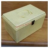 Retro yellow plastic sewing caddy with contents