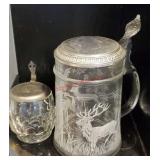 2 clear glass beer steins