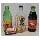 2 Moxie bottles, Moxie matches, & WC Fields mint