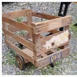 Small wooden car with 1953 license plate