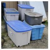 Pile of large plastic tubs with small tubs inside