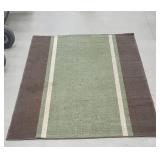 Brown and green striped rug - needs cleaning